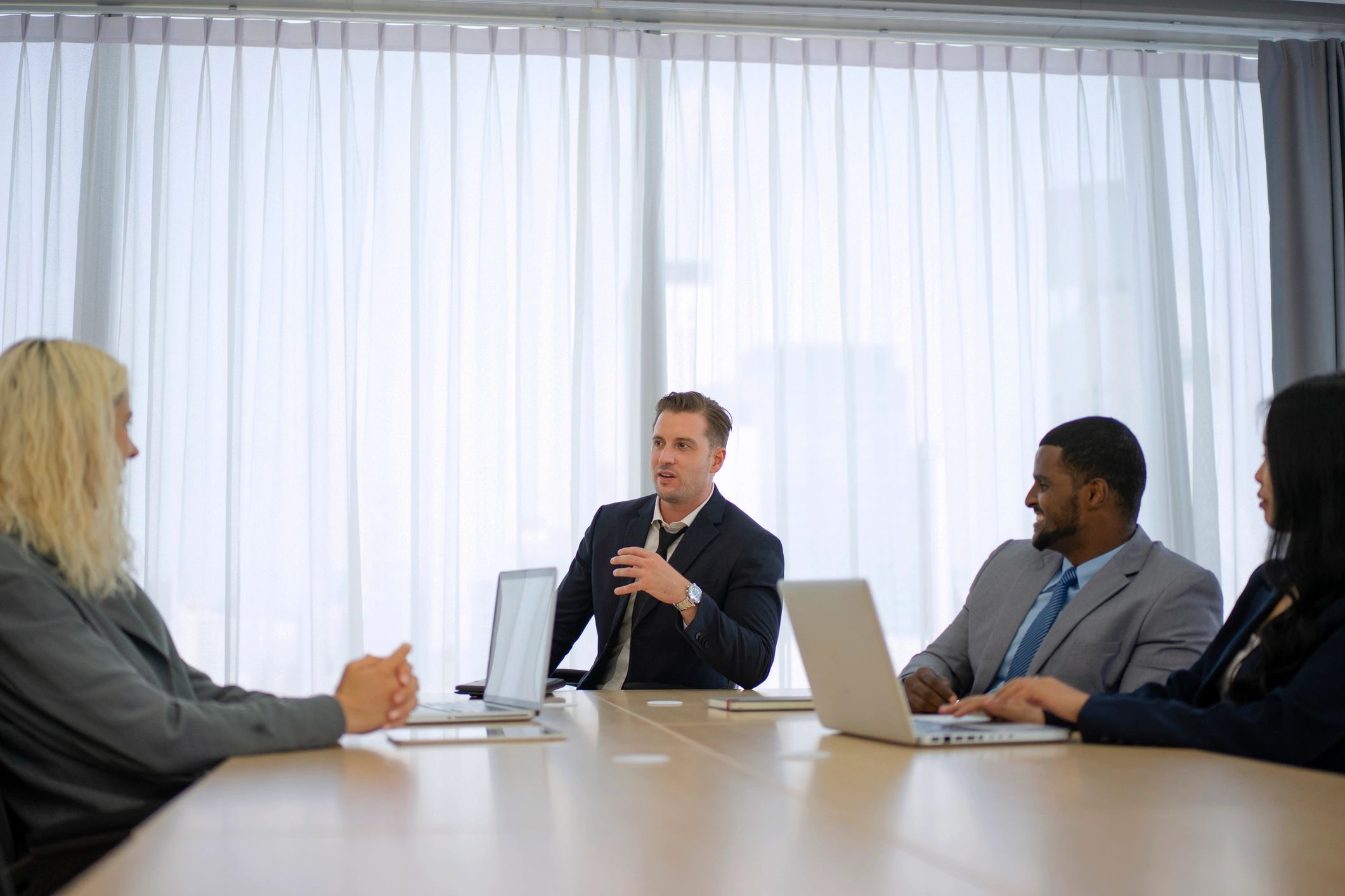 Managed services team meeting in conference room